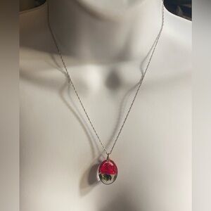 Vintage reverse-carved lucite pendant sterling necklace with a red rose design